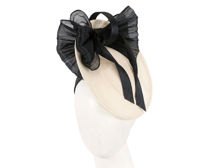 Bespoke cream sinamay fascinator with black bow by Fillies Collection