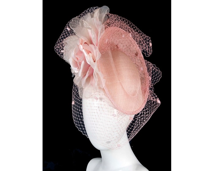 Pink racing fascinator with flowers and face netting by Fillies Collection