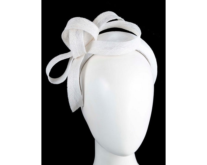 White sinamay bow on the headband by Max Alexander