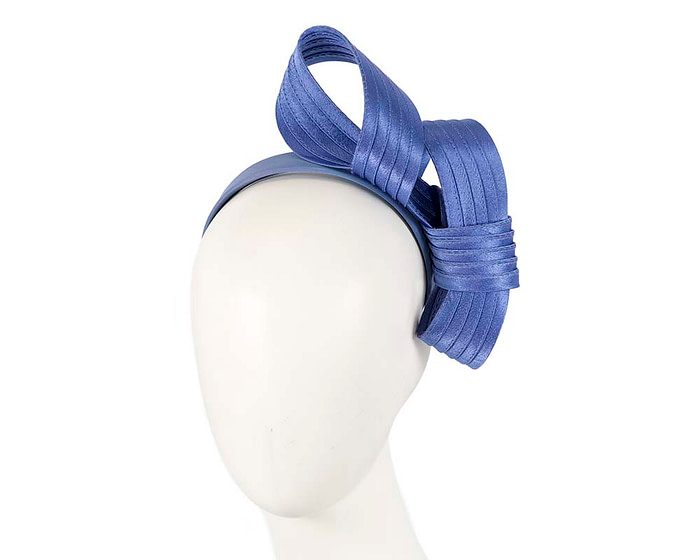 Curled blue fascinator by Max Alexander