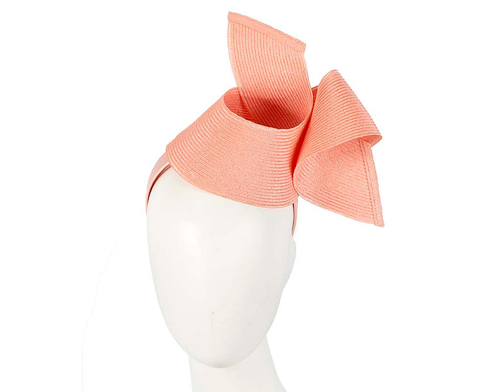 Modern coral fascinator by Max Alexander