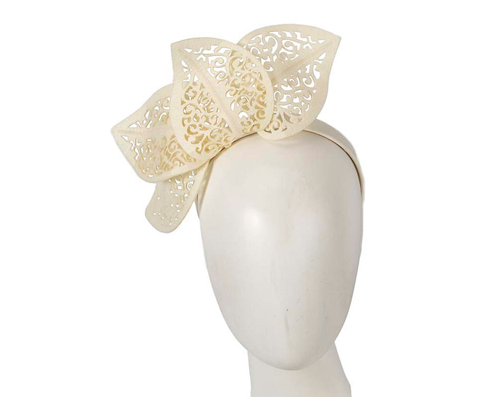 Modern cream racing fascinator by Max Alexander