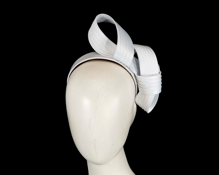 Curled white fascinator by Max Alexander