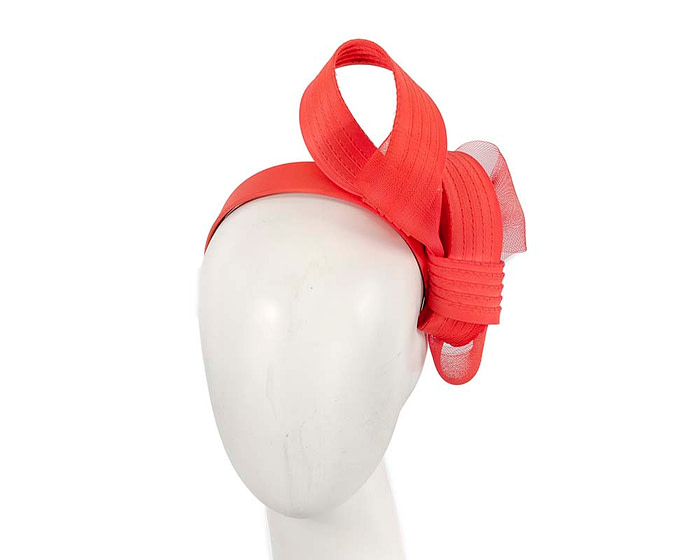 Curled bright coral fascinator