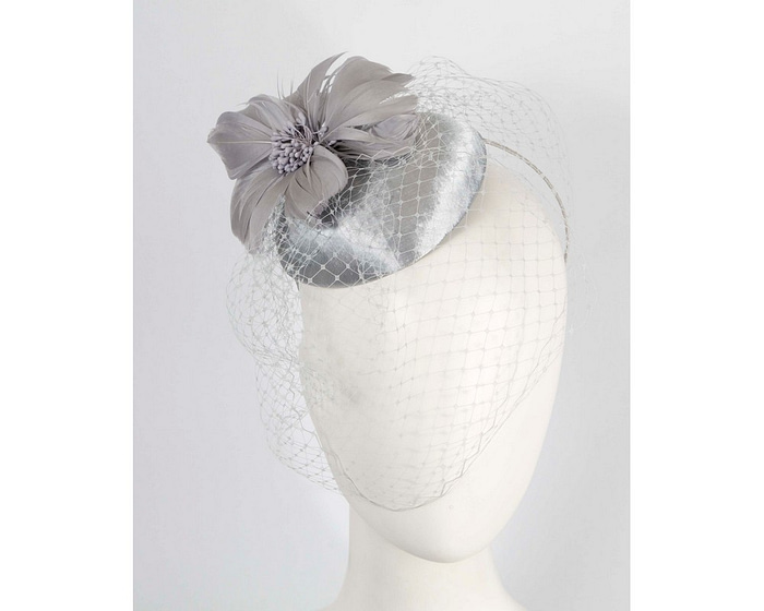 Silver fascinator with feather and veil