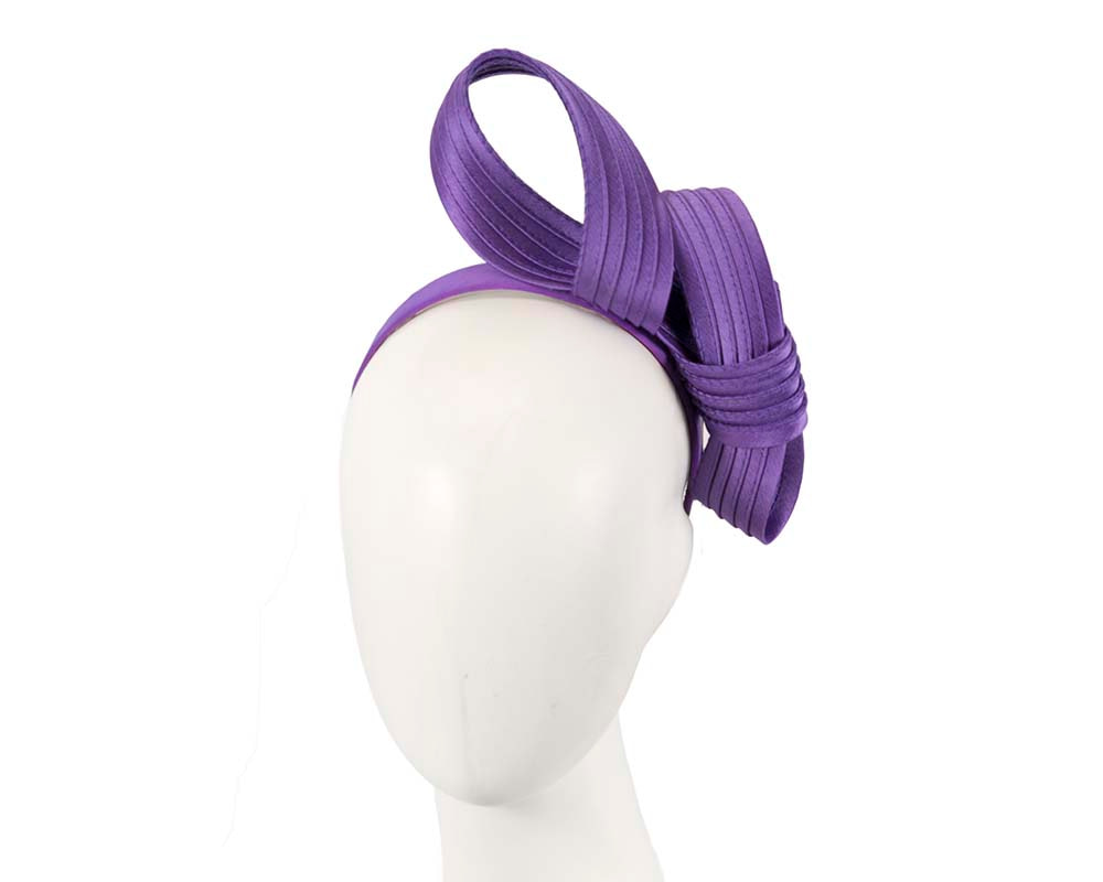 Twisted purple fascinator by Max Alexander