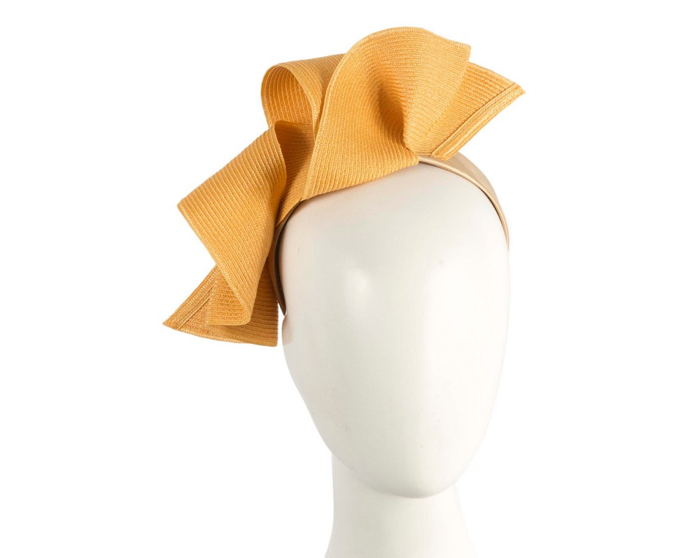 Mustard wave fascinator by Max Alexander