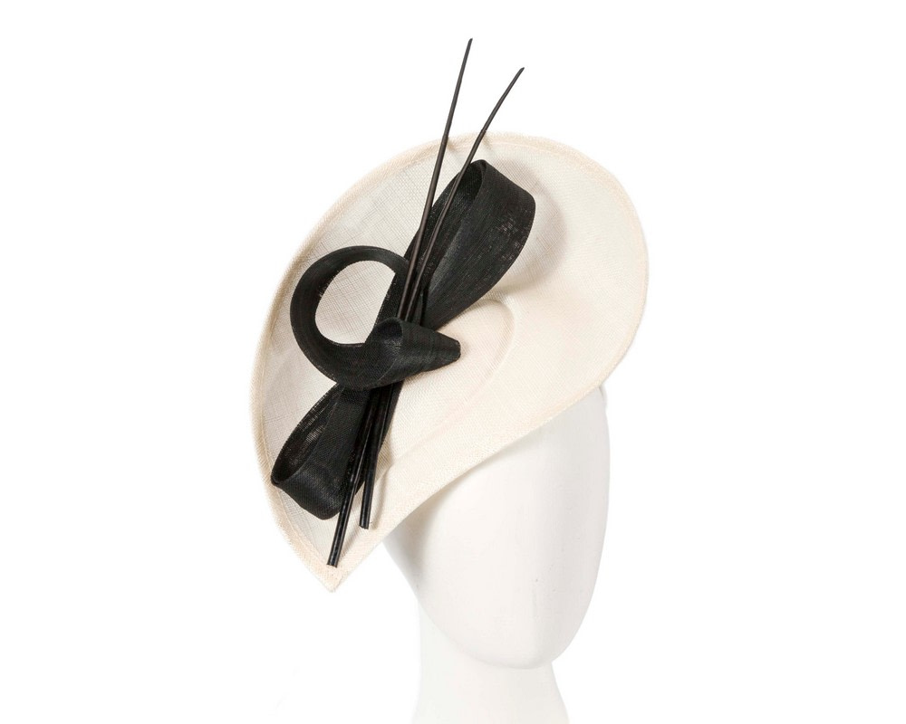 Cream fascinator with black bow and feathers