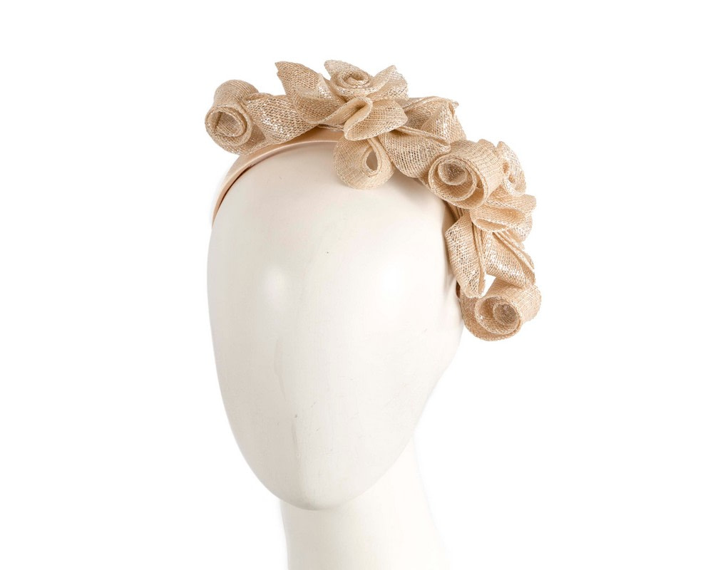 Champagne curly fascinator by Max Alexander