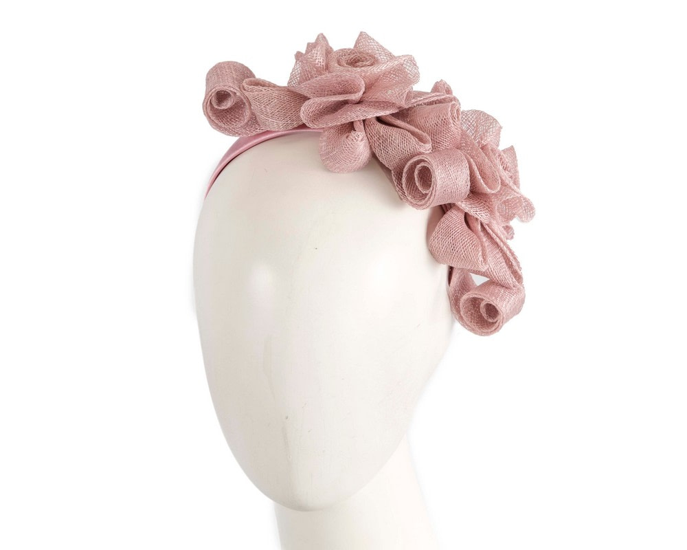 Dusty pink curly fascinator by Max Alexander