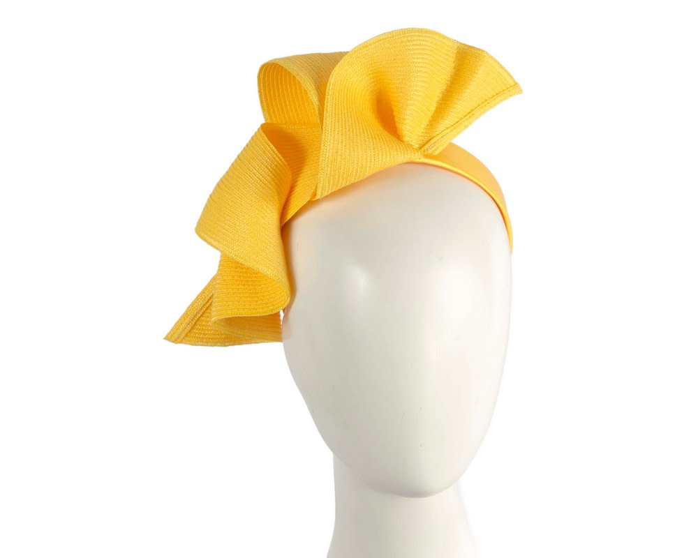 Yellow wave fascinator by Max Alexander