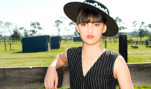 Cream wide brim racing fashion hat by Max Alexander